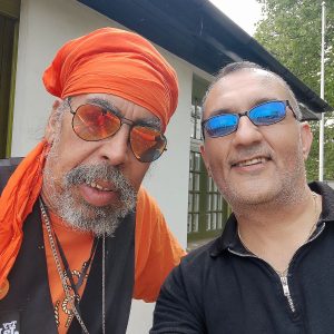 Back stage at Simmer Down Festival with Cat from Third World